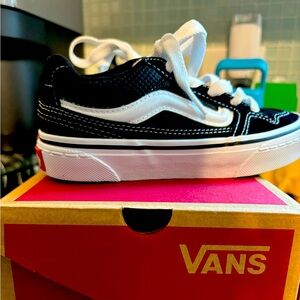 Black and white vans size 13. Brand new never worn.